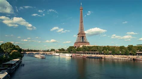 Eiffel Tower By The Seine River And Boats Paris Timelapse 4k Royalty