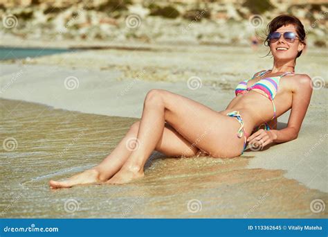 woman lying on the beach stock image image of blue 113362645