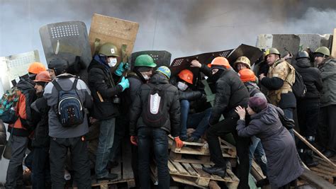 Ukraine leader replaces army chief as fires burn again in Kiev - CBS News