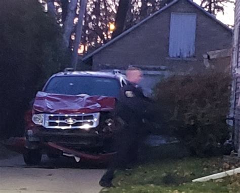 Waukesha Christmas Parade Moment Cops Swoop On Suv At Suspect S Home As It S Revealed Driver