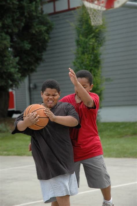 Two Boys Basketball Player And Footballer Stock Image Image Of