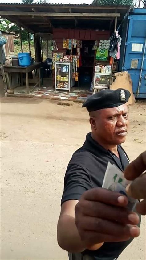 Police Officer Supo Syril Was Allegedly Caught On Camera Extorting Money From Motorists In Abia