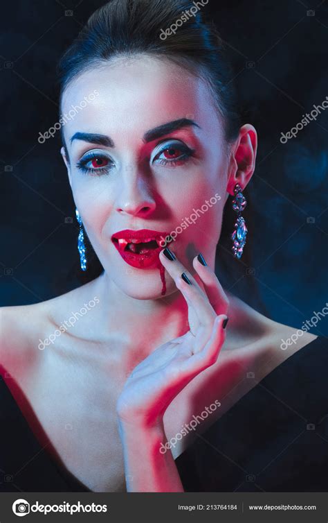 Sexy Vampire Woman Licking Her Fingers Dark Background Smoke — Free