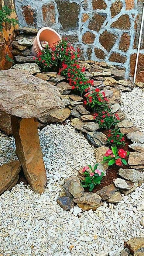 It looks like he also created a small rock sided pond with a rock slab bridge over it. Simple Rock Garden Decor Ideas For Front And Back Yard 22 | Rock garden landscaping, Backyard ...