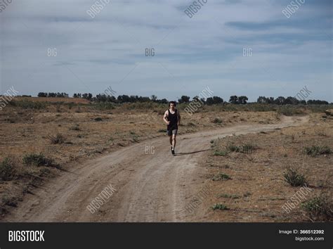 Man Runs Dirt Road Image And Photo Free Trial Bigstock