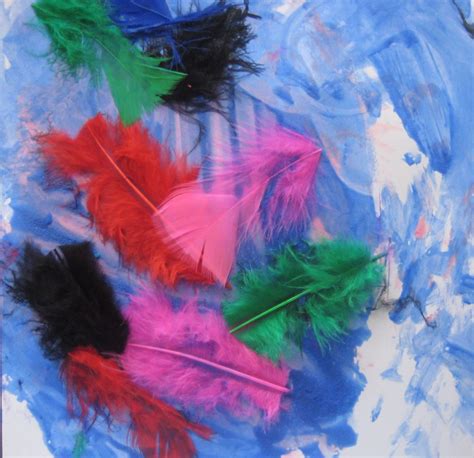 Preschoolers Painting With Feathers Activity