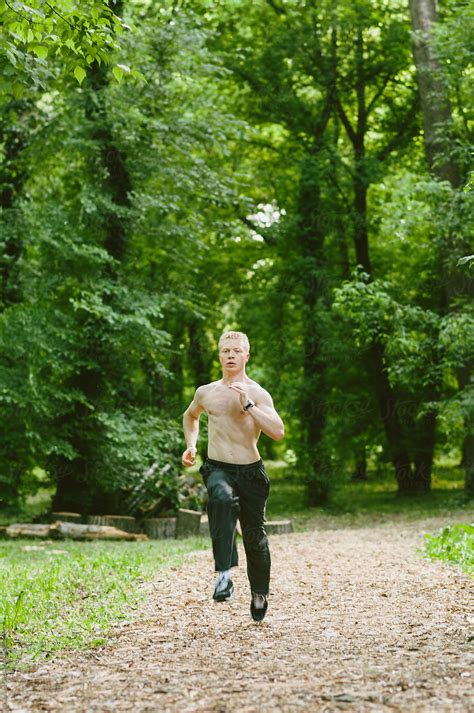 Handsome Half Naked Man Running Through The Forest By Brkati Krokodil Running Workout