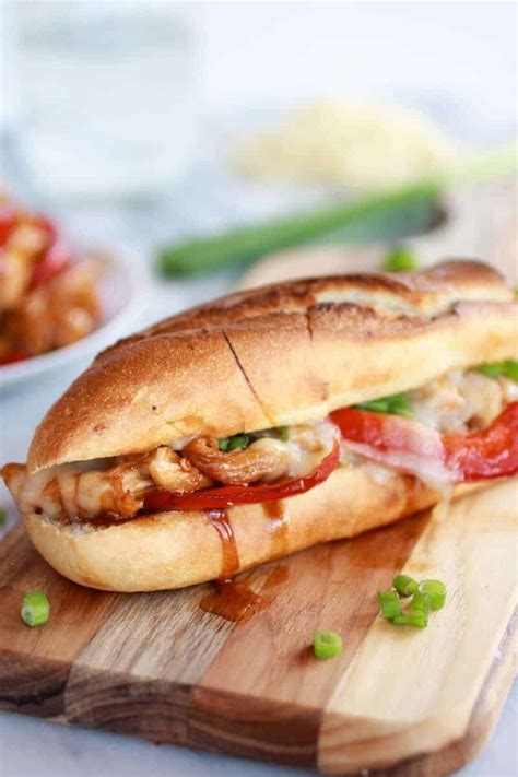 On bottom half of each roll or croissant, layer lettuce, tomatoes, chicken and green pepper. Half Baked Harvest - Made with Love