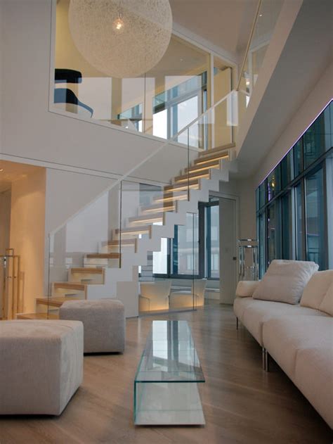 S was worried that her growing son would be tempted to leap the 24 inch tall railing and wanted a taller and more traditional replacement. Glass Stair Railing | Houzz