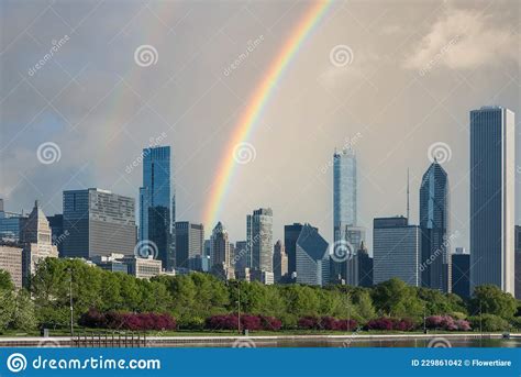 Chicago Skyline Along Lake Michigan In Rainy Day With Rainbow Stock