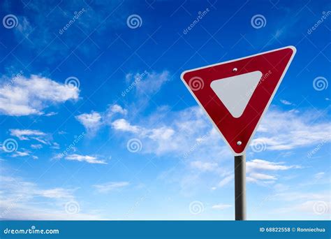 Traffic Yield Sign With Blue Sky Background Stock Photo Image Of
