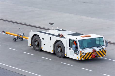 320 Airport Tow Truck Stock Photos Pictures And Royalty Free Images