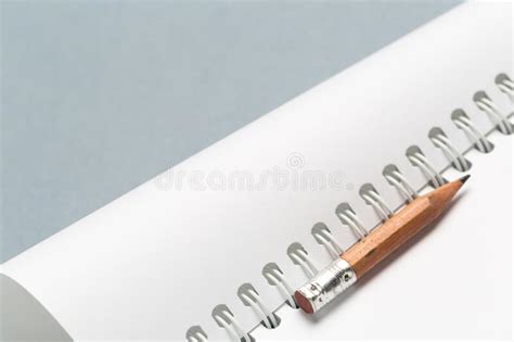 Short Worn Pencil With Notepad On Gray Desk Stock Image Image Of