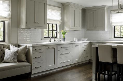 Light Gray Shaker Cabinets With Long Nickel Pulls Transitional Kitchen