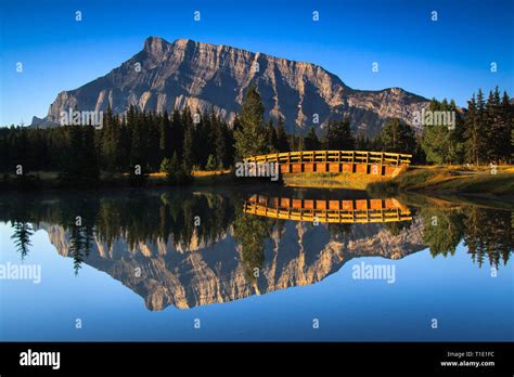 Perfect Still Reflection Of Mount Rundle In Two Jack Lake In Banff