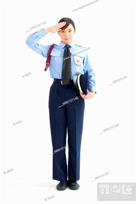 A Female Security Guard Saluting Stock Photo Picture And Royalty Free