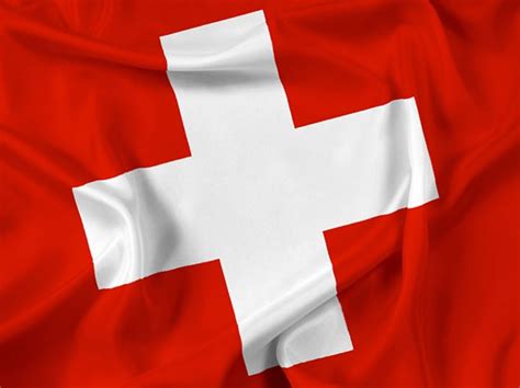 Swiss flag colors, history and symbolism of the national flag of switzerland. Switzerland Flag
