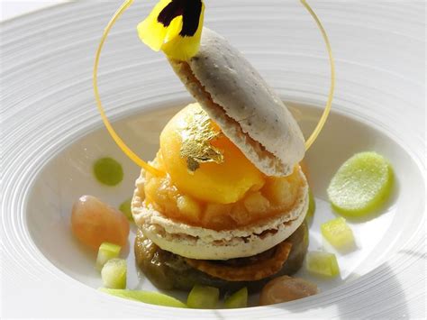 A dessert is typically the sweet course that concludes a meal in the culture of many countries, particularly western culture. Macaron dessert #plating #presentation | Food, Fine dining ...
