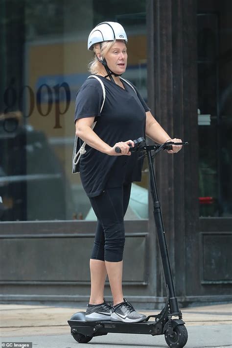 Deborra Lee Furness Looks Smooth On Her Electric Scooter In New York