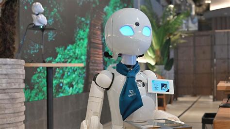 An Experimental Café In Nihombashi Where Avatar Robots Facilitate Human