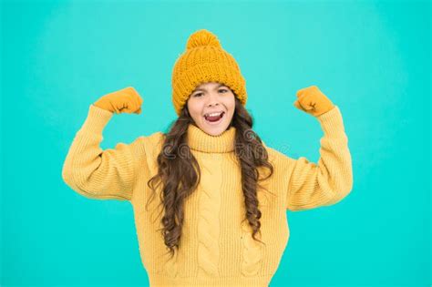 Energy Charge Child Cute Girl Hat And Gloves Show Biceps Gesture Of