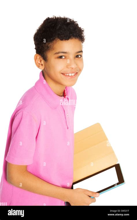 Happy And Smiling 10 Years Old Black Boy Standing With Tablet Computer