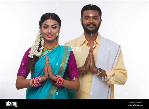 South Indian Couple Greeting And Smiling At The Camera Stock Photo Alamy
