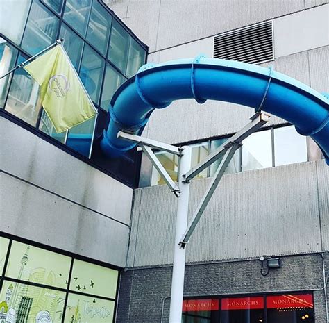 The Corkscrew Waterslide At The Eaton Chelsea Toronto Extends Outside Of The Building Fun