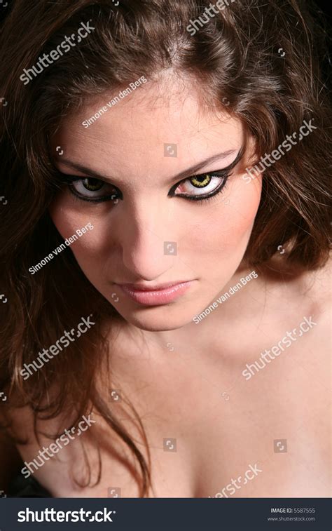 Beautiful Girl Wolf Eyes Intense Stare Stock Photo 5587555