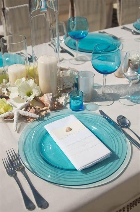 A wedding venue is not the only place for you to plan a perfect decor, table setting for the wedding is also a class apart. 35 Romantic Beach Wedding Table Settings - Weddingomania