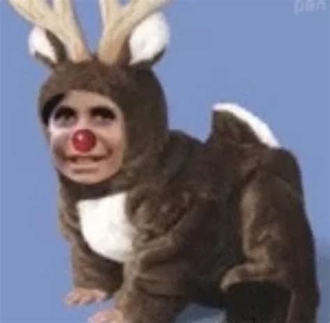 A Stuffed Animal With Antlers On Its Head