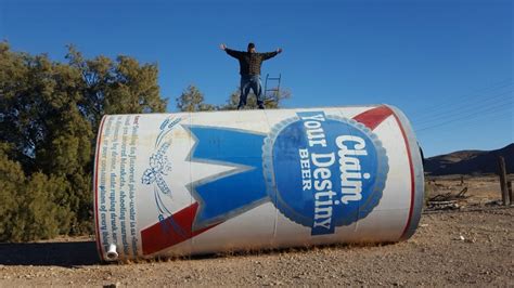 Climbing The Worlds Tallest Beer Can Worlds Biggest Beer Youtube