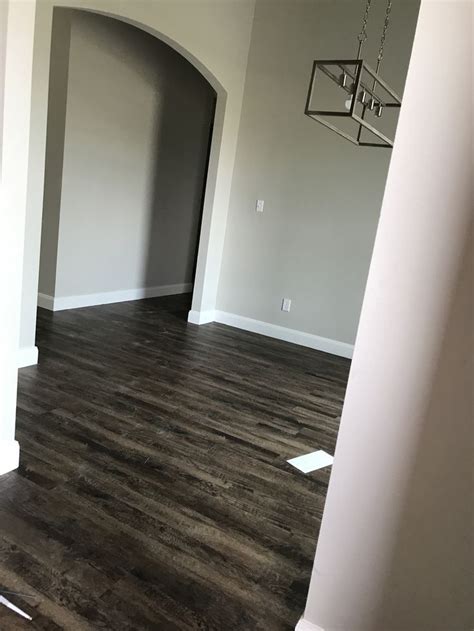 We need to layout some pad along the wall where we plan to start. Mohawk saddleback LVP walls worldly grey | Luxury vinyl ...