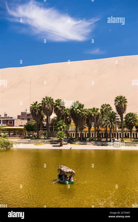 Huacachina Lagoon In Huacachina A Sand Dunes Surrounded Oasis Village
