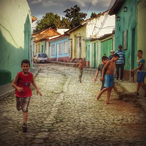 Maybe you would like to learn more about one of these? Niños cubanos jugando en la calle | Flickr - Photo Sharing!