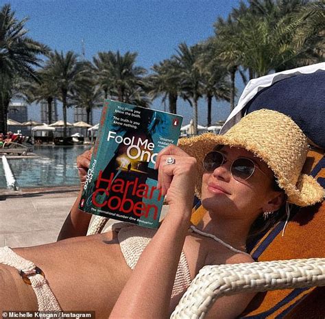 the secret s out sun kissed michelle keegan relaxes in a bikini as she reads the book for her