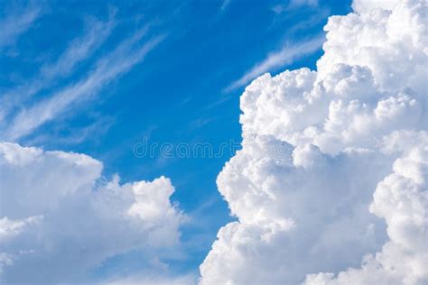 Deep Blue Skies With White Clouds Background With Space Stock Image