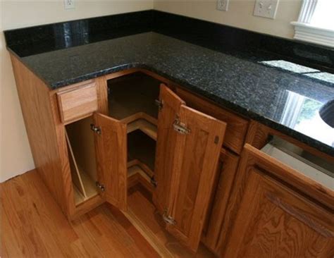 This granite look beautiful in kitchens with darker cabinets too! Oak Kitchen Cabinets With Granite Countertops / design ...