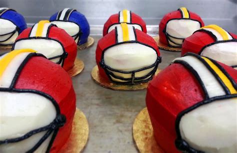 Cupcakes Dressed Up Like Football Helmets By Biteconfections Via Cake Central Cupcake Dress