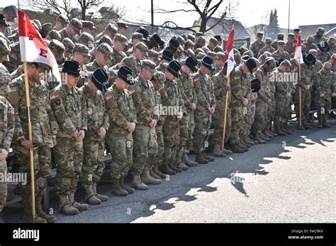 Troopers Assigned To 2nd Squadron 2nd Cavalry Regiment Bow Their