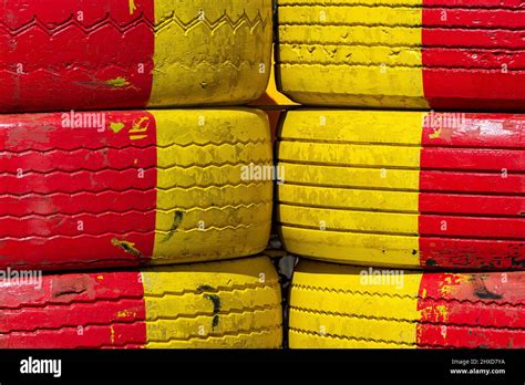 Construction Site Barrier With Yellow And Red Car Tires Hi Res Stock