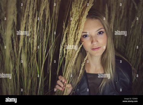 Teen Girl Night Portrait In Long Grass Stock Photo Alamy