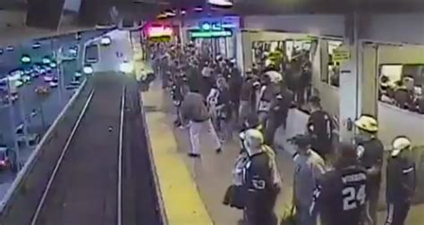 Surveillance Footage Captures Moment Bart Worker Rescues Man From Path Of Oncoming Train
