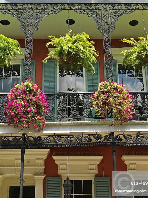 Colorful French Quarter Residential Street With Wrought Iron Balconies