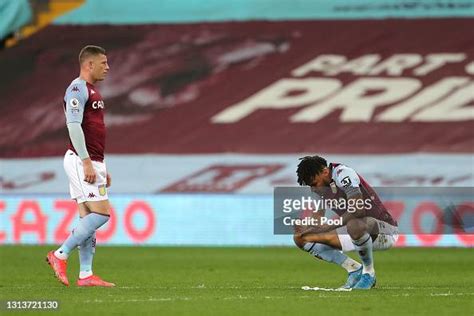 Ross Barkley And Tyrone Mings Of Aston Villa Look Dejected After The