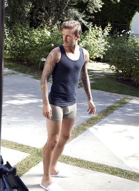 David Beckham Stars In H M Ad Saving The Day In His Underwear