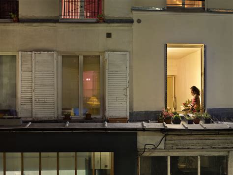 Voyeuristic Photos Capture Intimate Scenes Through Apartment Windows In Paris
