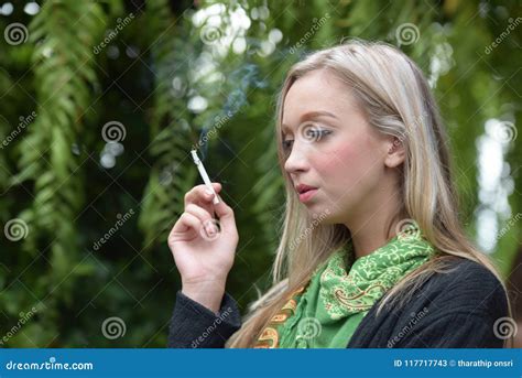 Portrait Of A Beautiful Young Woman Smoking Stock Image Image Of