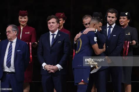 Kylian Mbappe Of France Is Embraced By Alexander Ceferin President
