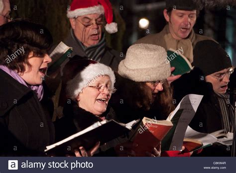 Christmas Tree Carol Singers Stock Photos And Christmas Tree Carol